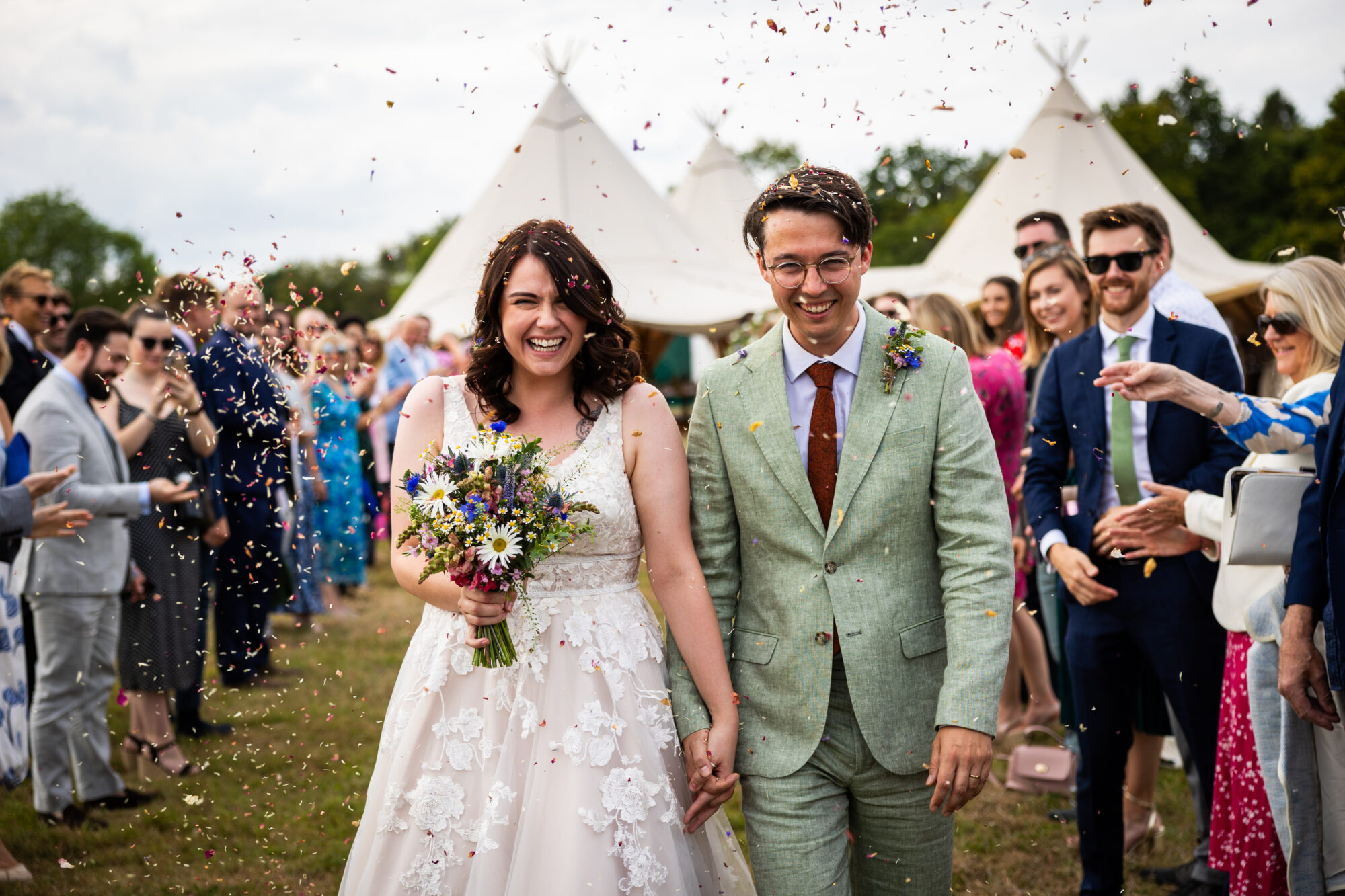 Confetti throw at Fiesta Fields wedding venue in Surrey