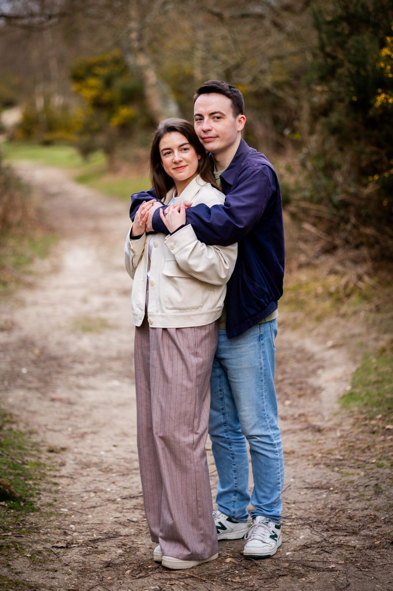 Headley Heath engagement shoot in Surrey featuring soft golden hour light, open heathland and relaxed, natural pre-wedding photography.